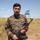 Amir Taaki with a Kalashnikov.